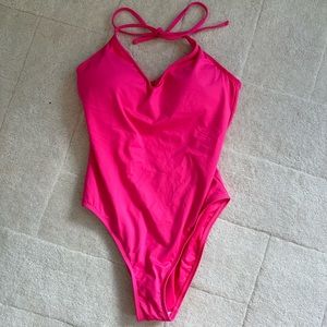 La Blanca neon pink one piece.